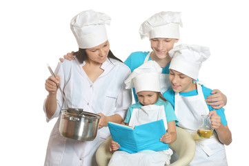 Mother and children cooking