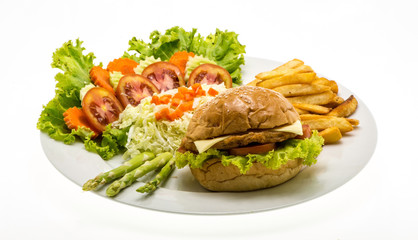 homemade cheese chicken burger with fresh salad on plate