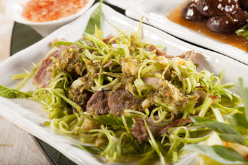 beef and morning glory, mix of raw morning glory and beef, Thai
