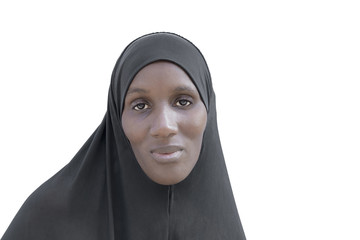 African woman wearing a black cotton veil, isolated - obrazy, fototapety, plakaty