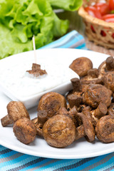 fried mushrooms with yogurt sauce, vertical