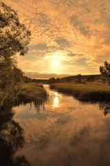 Sunset over river.