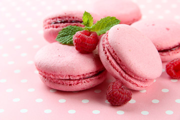 Gentle macaroons on table close-up