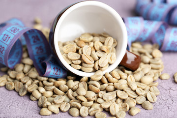 Raw green coffee beans and measuring tape,