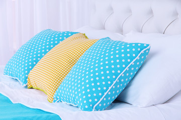 Comfortable soft bed with pillows