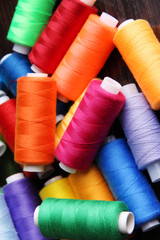Multicolor sewing threads background