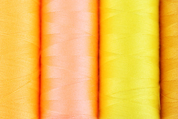 Multicolor sewing threads background