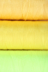 Multicolor sewing threads background