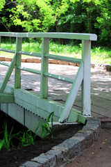 Small bridge in green park