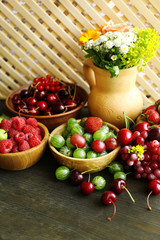 Still life with berries and flowers