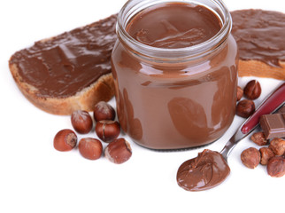 Sweet chocolate cream in jar isolated on white