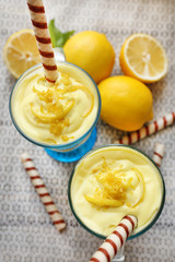 Fototapeta na wymiar Tasty lemon desserts on table at home