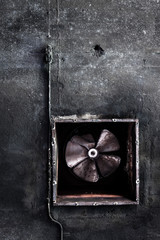 Abandoned air conditioning duct and rusted fan