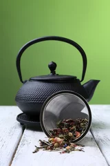 Foto op Aluminium Black teapot, bowl and tea © Africa Studio