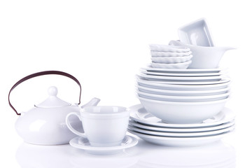 White crockery and kitchen utensils, isolated on white