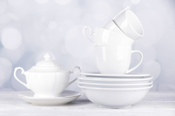 White crockery and kitchen utensils,