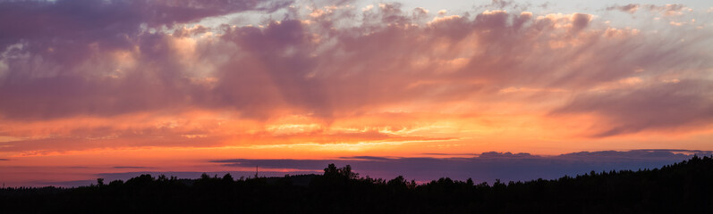 Fototapeta na wymiar Panoramic photo of vibrant sunset