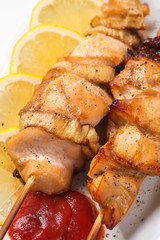 Grilled chicken meat on skewer