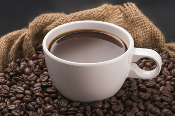 Hot Cup of Coffee With Coffee Beans