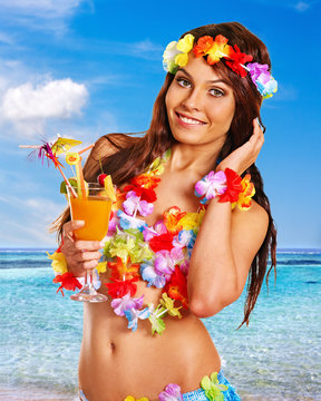 Woman In Hawaii Costume Drink  Juice.