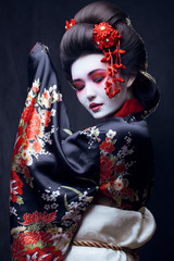 young pretty geisha in kimono © iordani