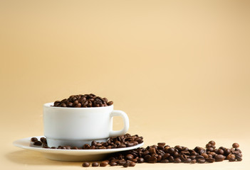 Cup from coffee on  grains