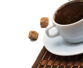 Cup of coffee standing on the desk