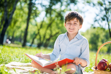 Boy in summer park
