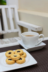 Cookie with cup of cofee