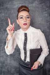 Strict teacher showing finger