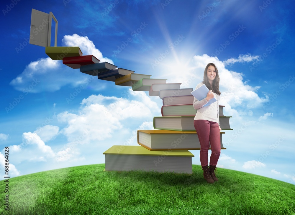 Poster composite image of smiling student holding textbook