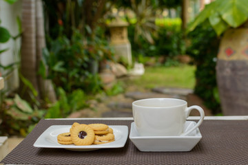 Sweet and cup of coffee
