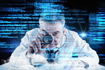 Composite image of mature businessman running diagnostics