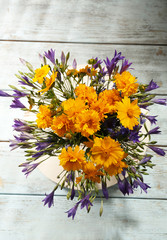 Beautiful wild flowers on table