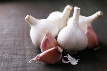 Garlic on black wooden background