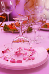 Buffet table with dishware waiting for guests