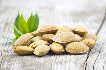 almonds on old wooden background