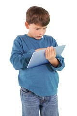 Cute little boy using tablet pc