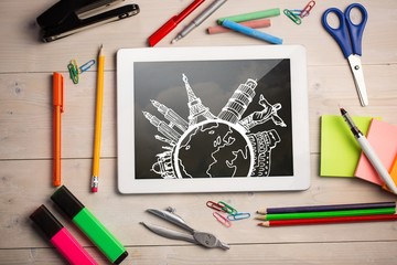 Composite image of digital tablet on students desk