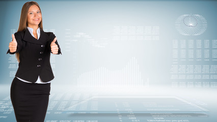 Businesswoman showing two thumbs up