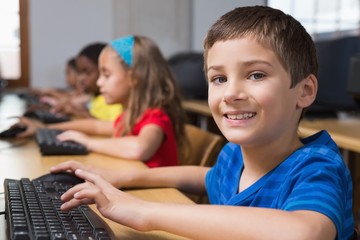 Cute pupils in computer class
