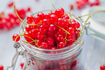 red currant fruit jar wooden table