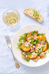 salad with peaches, bacon; arugula, spinach and goat cheese