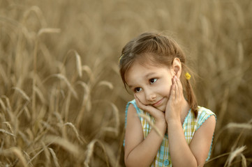Little girl in field