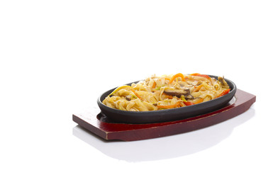 Udon noodles. Asian food. Vegetables. Mushrooms. Isolated.