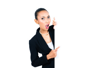 Asian businesswoman showing empty white board