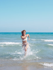 Fototapeta premium attractive woman in bikini