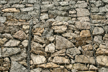 Fototapeta premium Gabion plastic covered wire mesh baskets filled with stone