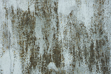 Old paint on rusty metal surface