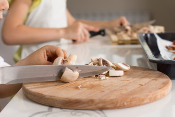 Fototapeta na wymiar Slicing Ingredients on Round Chopping Board